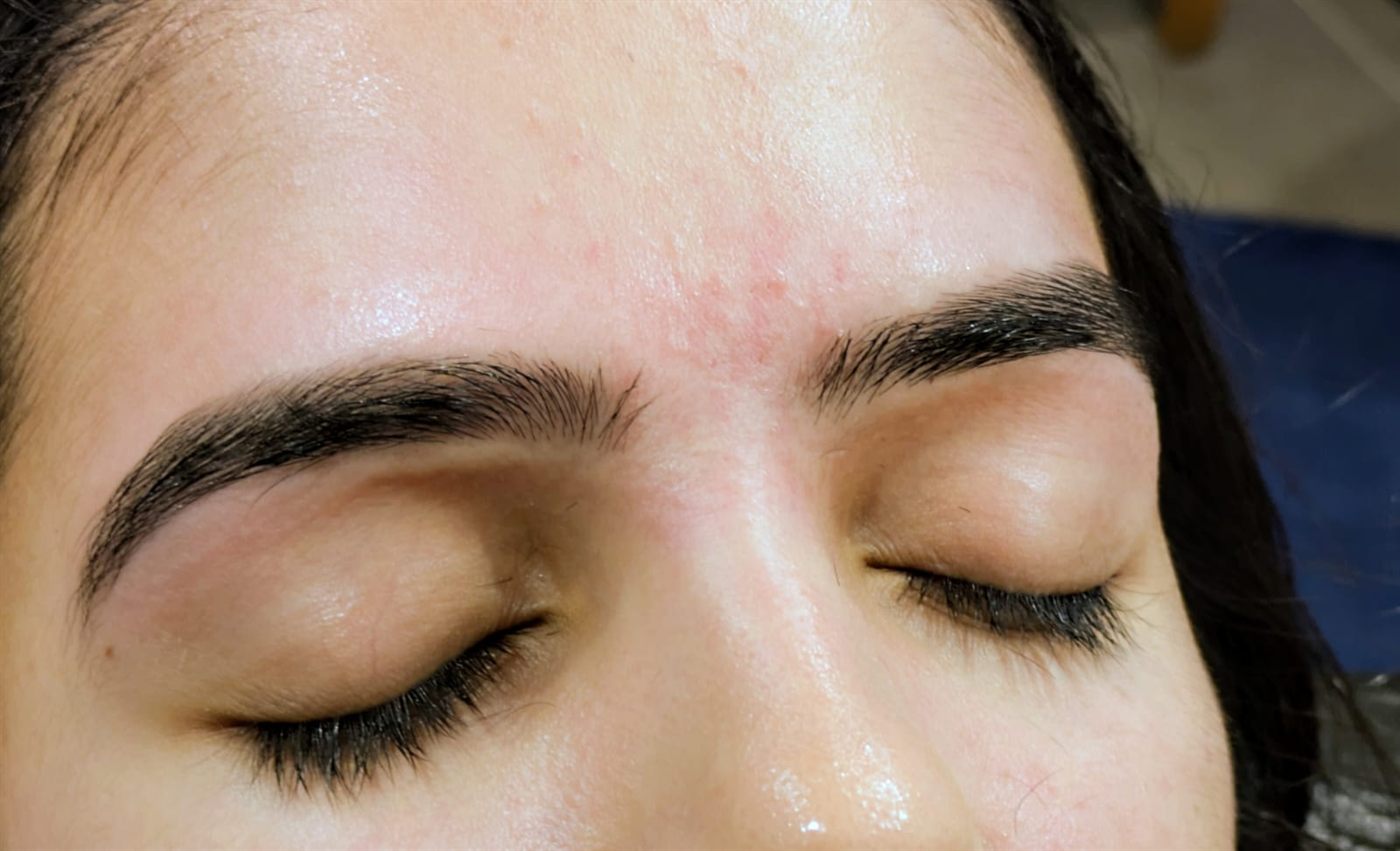 Eyebrows shaped by threading at Drashti Beauty Salon in Truganina, with a clean arch and a defined tail on each brow.